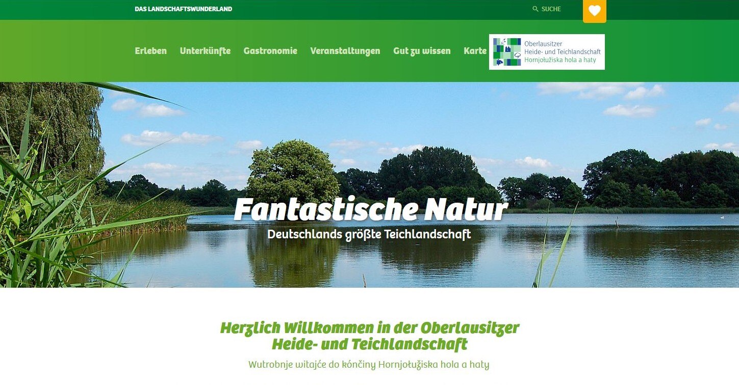 Screenshot der Website der Oberlausitzer Heide- und Teichlandschaft mit einem Foto mit Blick auf einen Teich.
